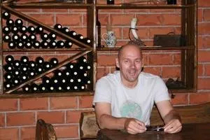Pepo enjoying some local wine
