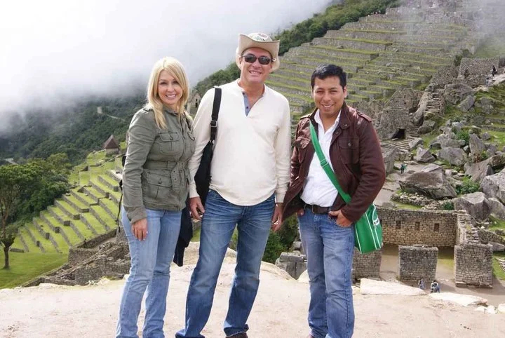 Aaron guiding visitors to Machu Pichu, Peru