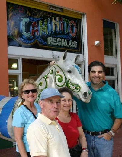 Hernan (right) with some visitors in La Boca, Buenos Aires
