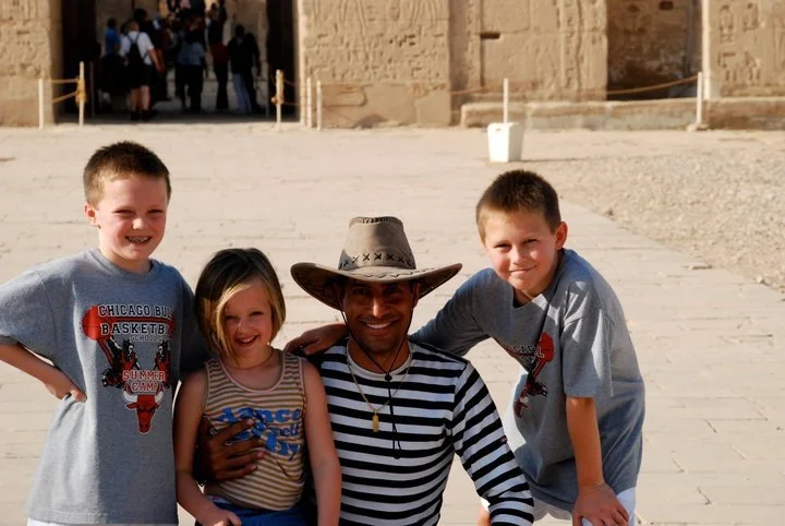 Egyptian guide Melad with a trio of mini-travelers