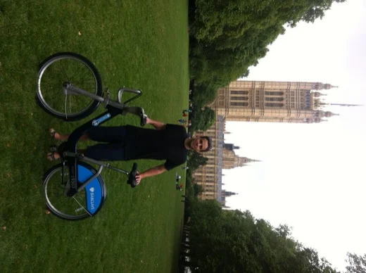 Biking in front of London's houses of parliament