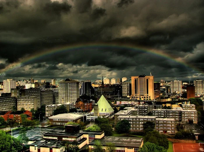 Rainbow over a stormy Glasgow Cityscape