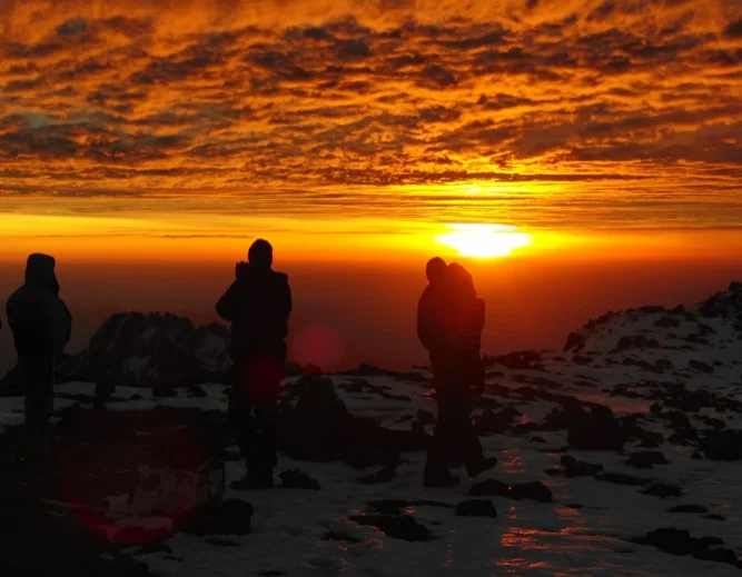 Sun rises over the top of Kilimanjaro