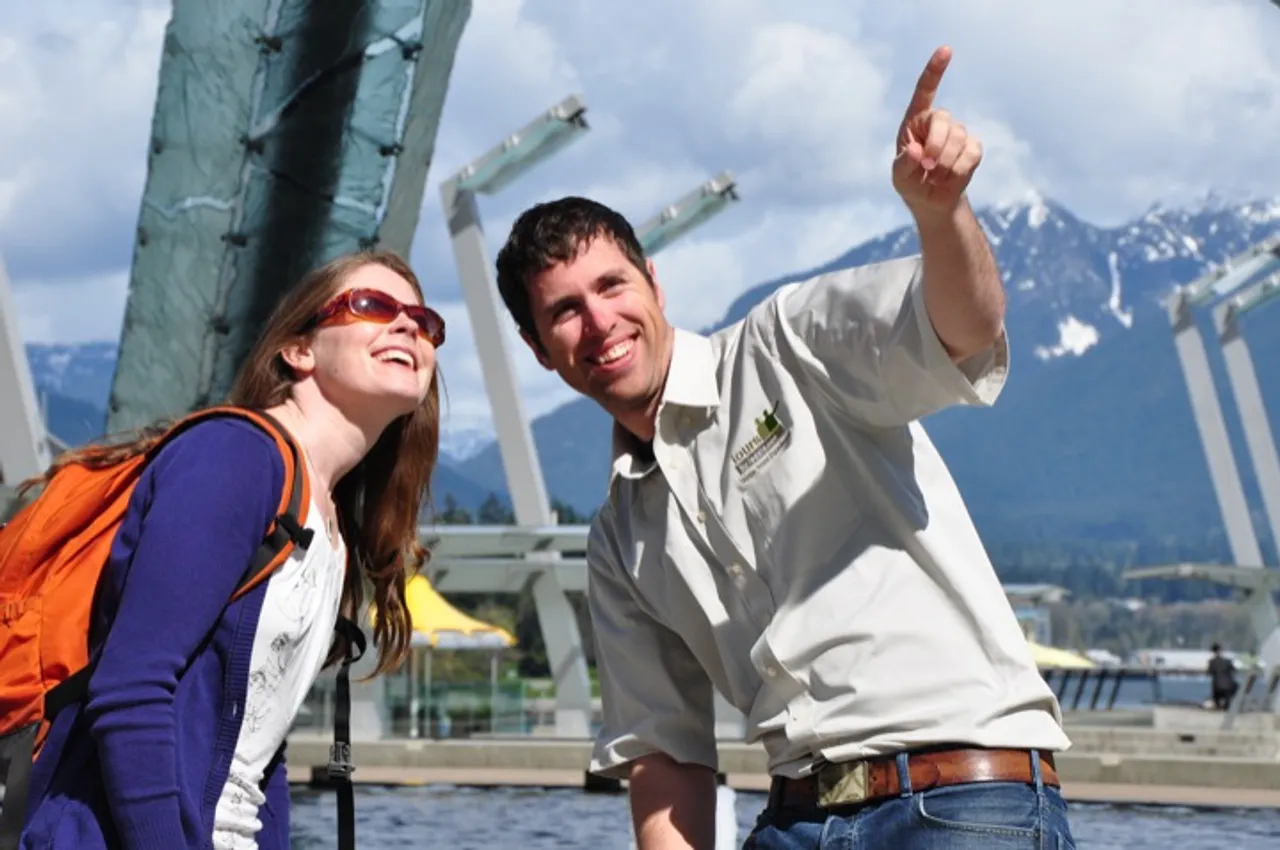 Colin Garritty shows Sara around Coal Harbour, Vancouver