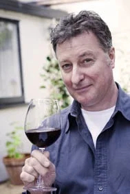 Guide Phil, enjoying a glass of wine near Auckland, New Zealand