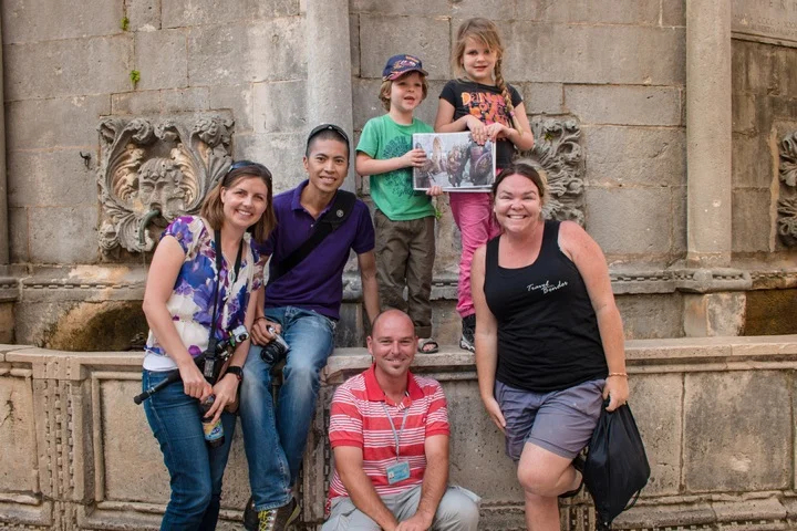 Family and friends enjoying time with Tom in Dubrovnik (photo courtesy of www.travelwithbender.com)