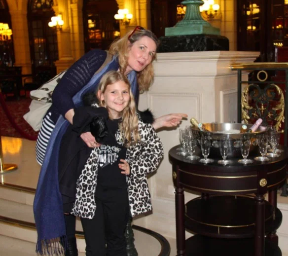 Genevieve with a young visitor to Paris