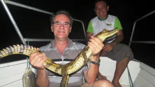 Catching (and releasing!) alligators in the Amazon