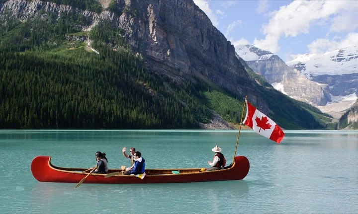 Does it get more Canadian than a canoe at Lake Louise?