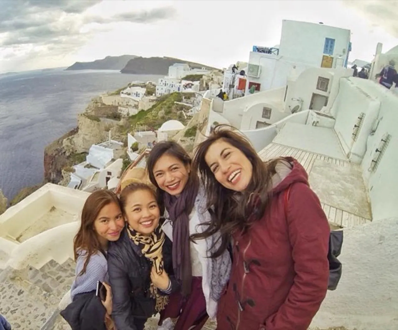 Dimitra and guests enjoying Santorini
