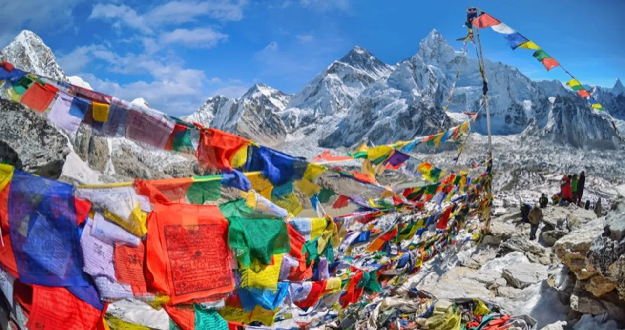 View of Everest with Tibetan prayer flags, Nepal