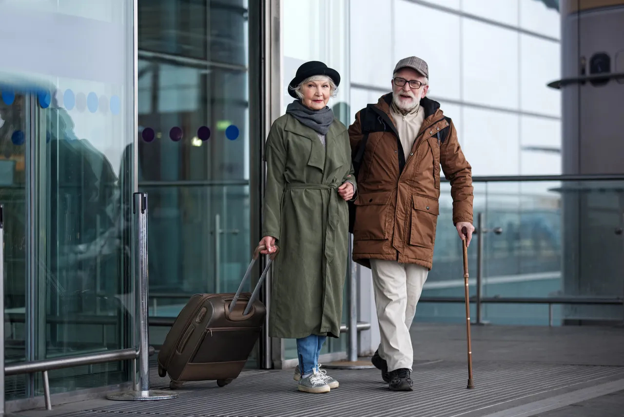 Elderly couple travelling