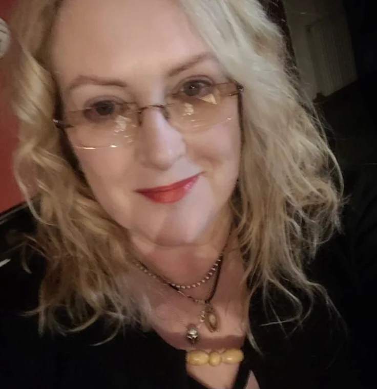 Elaine M.