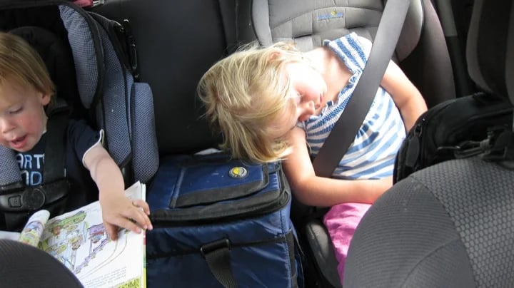 A neck pillow would have helped...(Highly recommend Richard Scary's "Busytown" books for younger kids!)