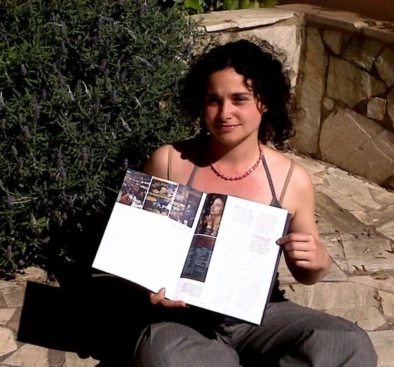 Marta (with a picture of herself in Jamie Oliver's magazine)
