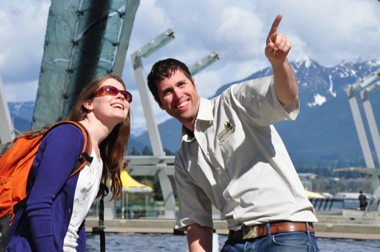 Colin Garritty shows Sara around Coal Harbour, Vancouver