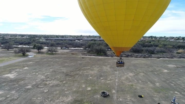 Hot Tubbing in a Hot Air Balloon - draining water prior to landing.