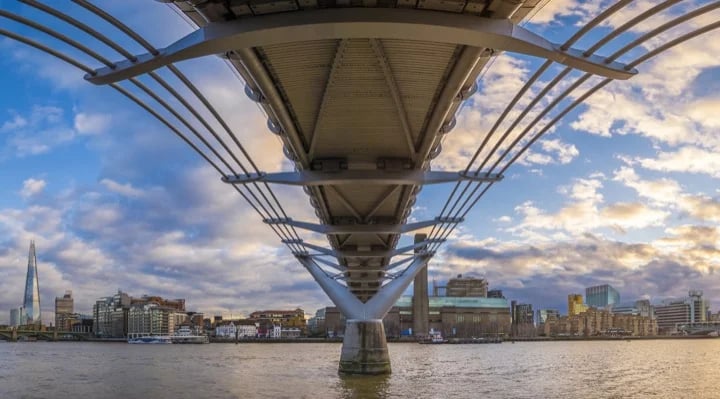 London as glimpsed from underneath the Millennium Bridge