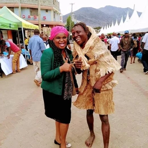 In voi attending the Taita Taveta Cultural festival. The man with me is wearing taitas cultural attire made from a baobab tree 