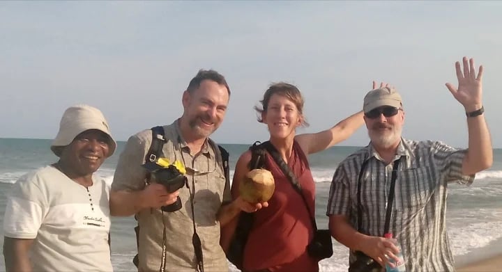 My guests are from USA. We are posing and have the indiana ocean at our back.
