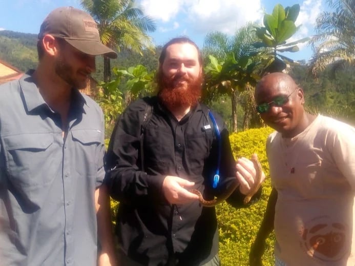 My guests are from USA, We find a baby snake (tree boa) in Ranomafana National park