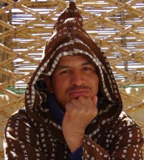 this local cloth is a handicraft named jilaba , made of wool , warm in cold winter