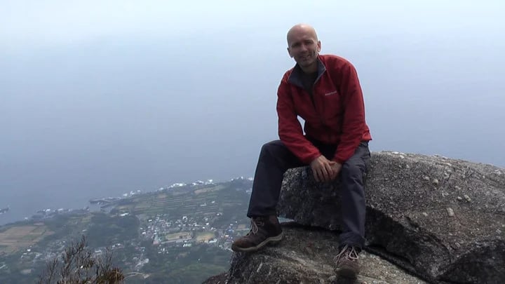 Steve on the summit of Mocchomu dake (940m) - Yakushima
