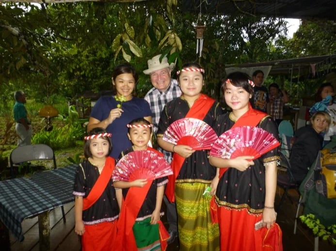 Posing with my guest from the UK at a Dusun cultural performance