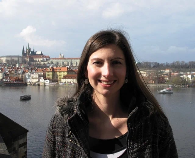 Lenka with the Prague castle behind