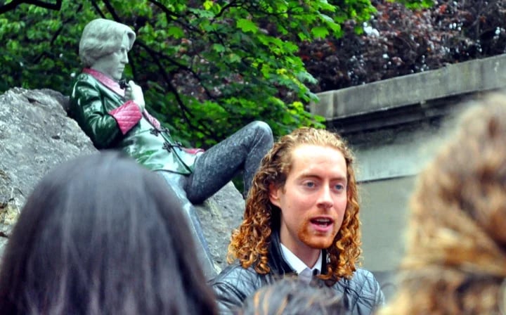 In front of Oscar Wilde
