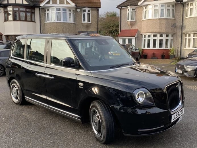 Modern Electric Taxi with Panoramic Roof