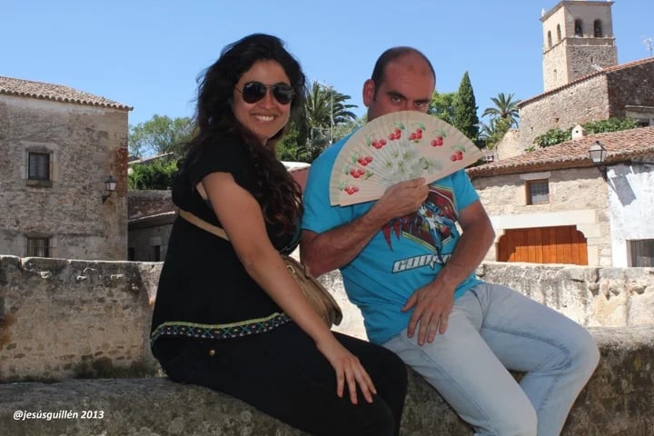 Teaching her how to use a Spanish fan.
