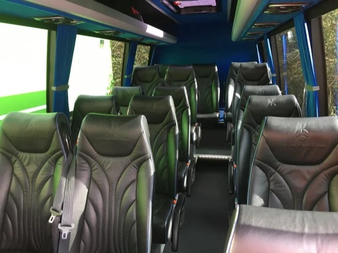 Interior of my 16 seater Mercedes Sprinter. Comfy reclining seats with individual power points.