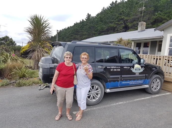 Happy customers outside the Lake Ferry pub