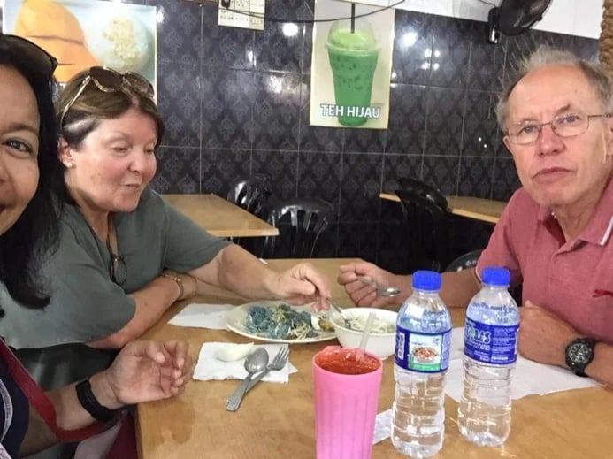 Trying local food in Kampung Baru.