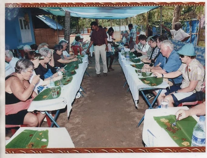 Kerala Traditional Lunch serving on Banana leaf at village house