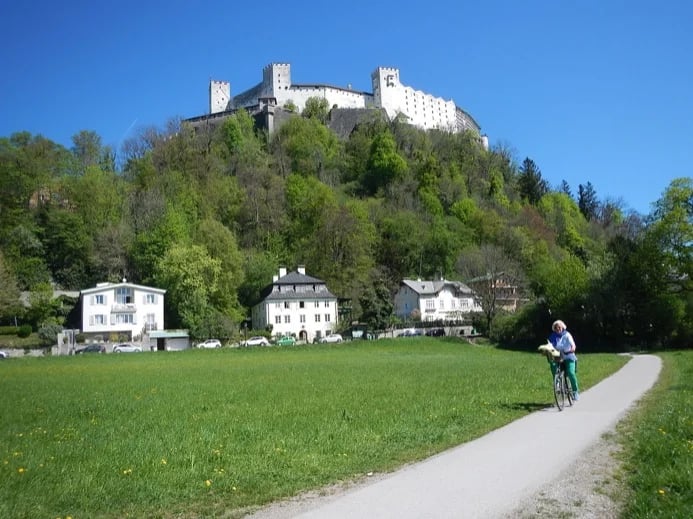 Riding home after a city tour... behind me: rear side of the famous Salzburg Fortress