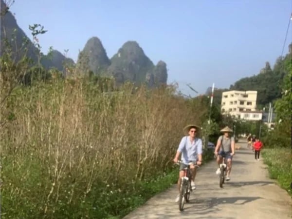Bike Tour to Jiuxian Village & Rafting on Yulong River