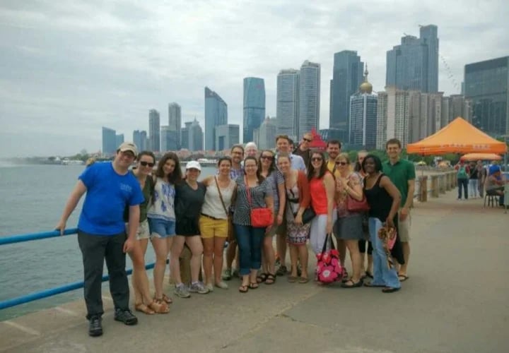 Fun group with the city in the background