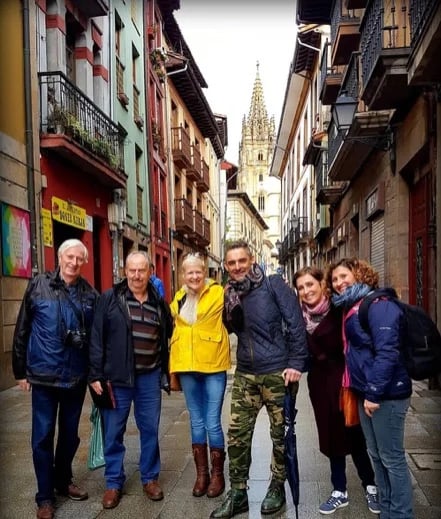 When customers become friends forever. View of the tower of Oviedo Cathedral