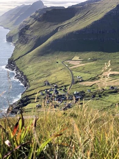 On the highest path between villages in the Faroe Islands looking over the beautifull village of Mikladalur, home to the mysterious Sealwoman.