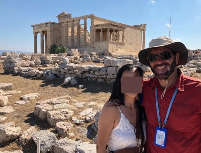 With a modern Caryatid next to the ancient ones!
