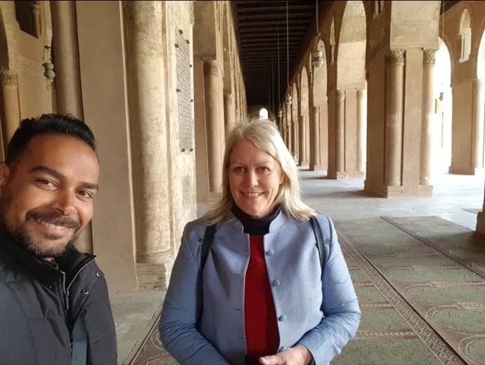 Touring a lady traveller through a temple