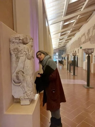 Me examining an artpiece