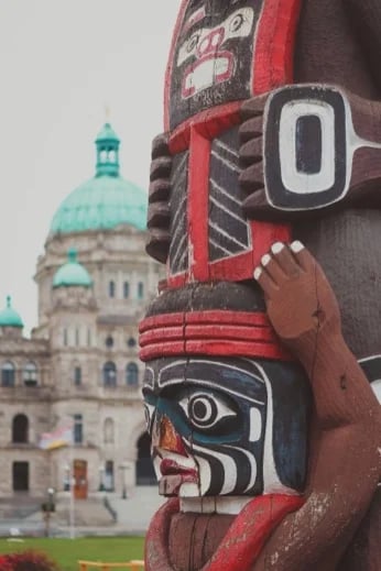 Totem pole on the lawn of the BC Legislature.