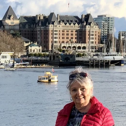The setting for this photo features the iconic Fairmont Empress Hotel, serving as a picturesque backdrop to a Victoria "Pickle Boat." These unique water taxis provide 13 ferry stops with a harbour tour.