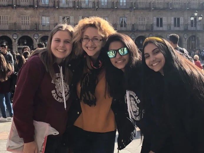with students of the University at Plaza Mayor de Salamanca