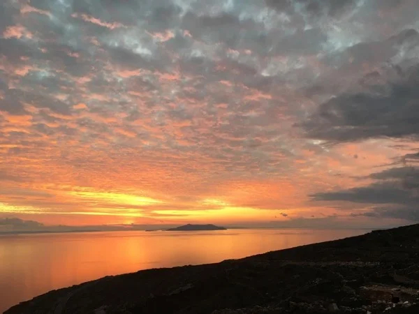 Stunning sunset on the South of Tinos