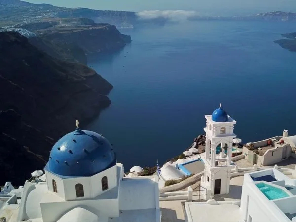 Azzure Majesty: The Blue Domes of Santorini