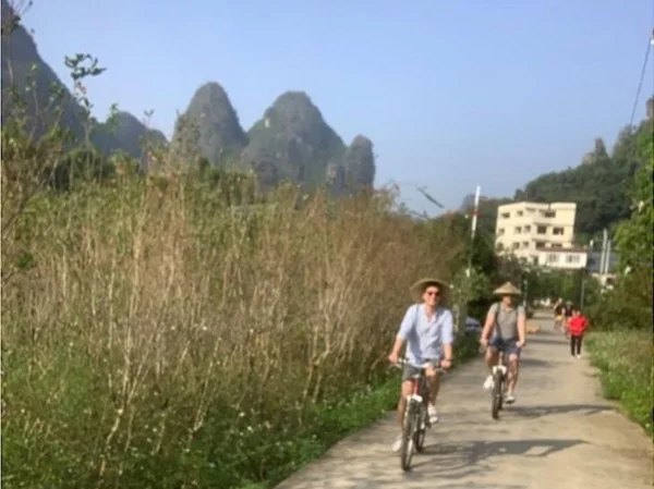 Bike Tour to Jiuxian Village & Rafting on Yulong River